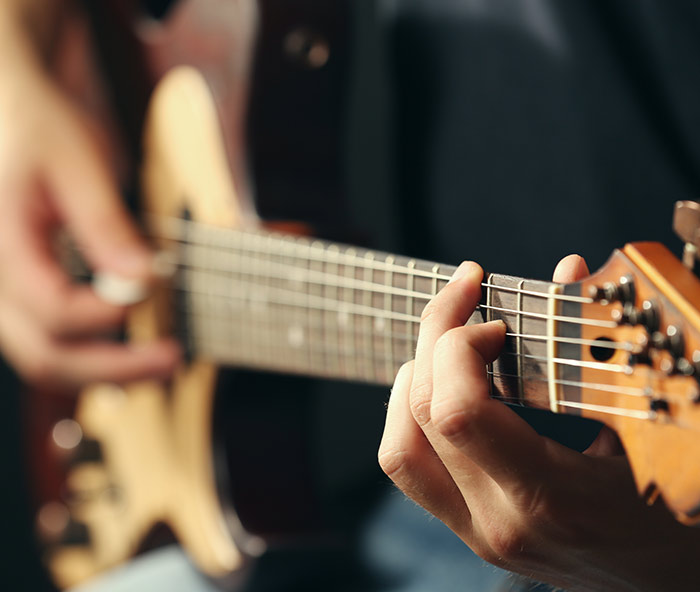 Main guitar/musician promo banner for BDL art & music 2024.